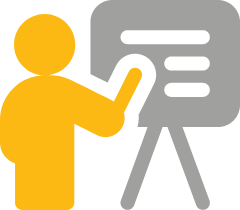 An image of a yellow figure pointing to a grey easel.